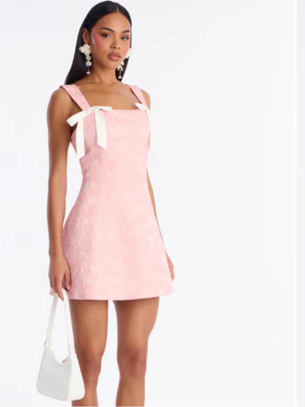 Pink mini dress with bows